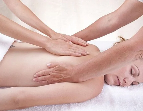 Hands-on body massage detail from the Royal treatment archive.